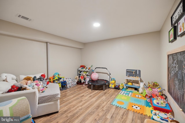 12527 Misty Water Dr, Herndon, VA 20170 - recreation room featuring recessed lighting, visible vents, and wood finished floors