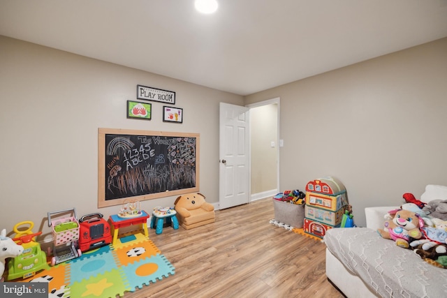 12527 Misty Water Dr, Herndon, VA 20170 - game room featuring baseboards and wood finished floors