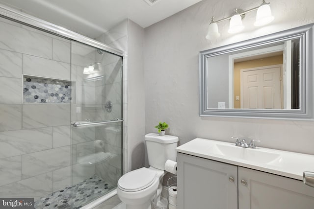 12527 Misty Water Dr, Herndon, VA 20170 - bathroom featuring toilet, a stall shower, and vanity
