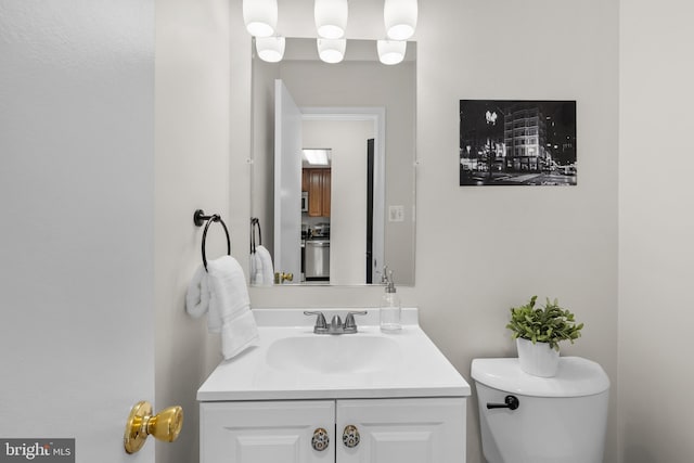 half bath with toilet and vanity