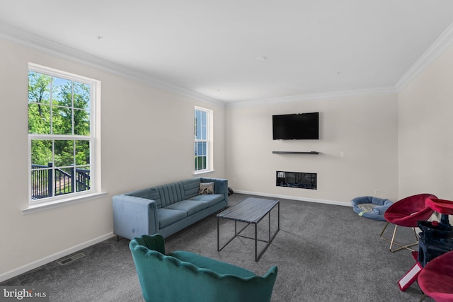 living room featuring baseboards, visible vents, crown molding, and carpet floors