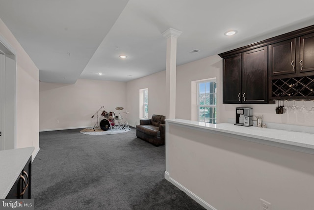 bar featuring dark carpet, bar, visible vents, baseboards, and recessed lighting