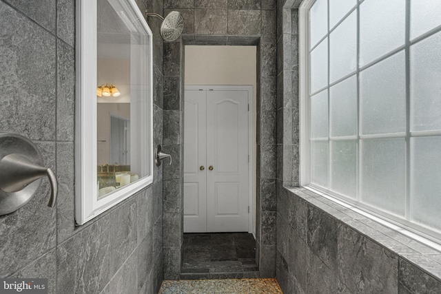 stairway with tile walls