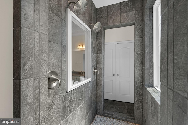full bathroom with tile walls and a walk in shower