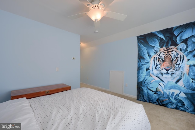 bedroom with ceiling fan and carpet flooring