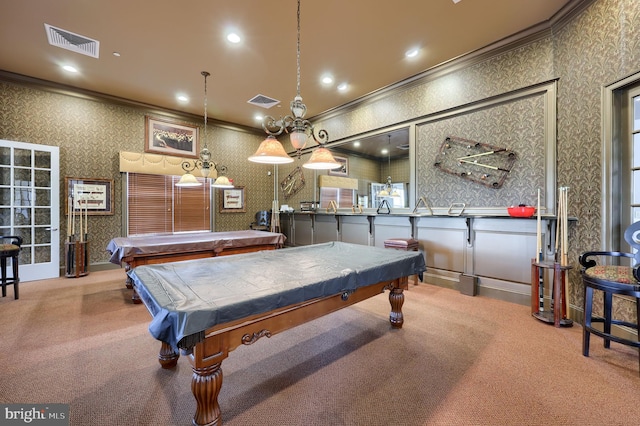 recreation room featuring visible vents, crown molding, wallpapered walls, and carpet floors
