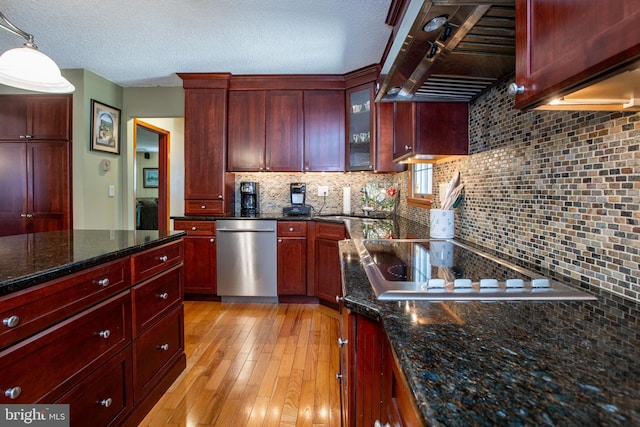kitchen featuring exhaust hood, tasteful backsplash, dark brown cabinets, dishwasher, and light wood finished floors