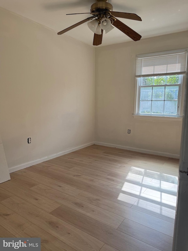 7601 Somerset Ln, Manassas, VA 20111 - unfurnished room with light wood-style flooring, a ceiling fan, and baseboards