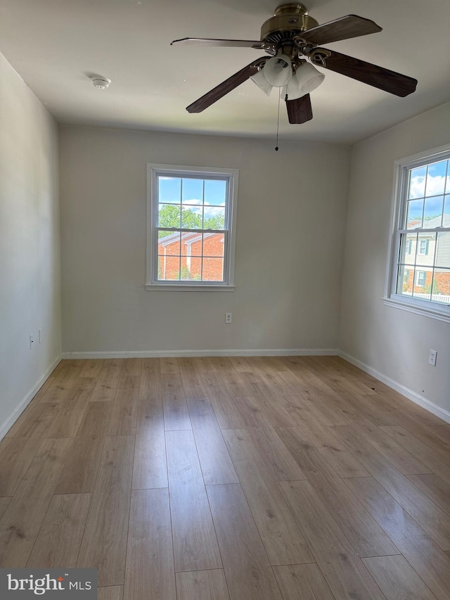 7601 Somerset Ln, Manassas, VA 20111 - empty room featuring wood finished floors, ceiling fan, and baseboards