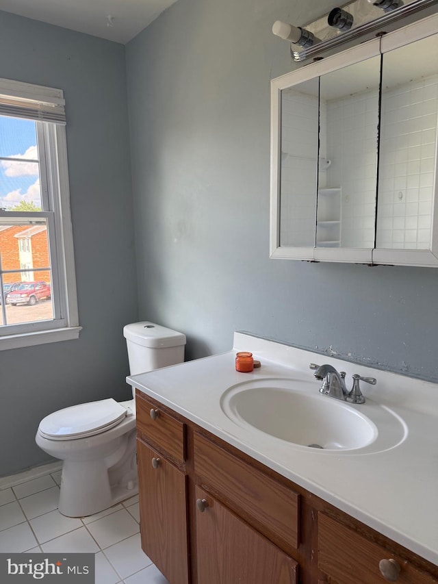 7601 Somerset Ln, Manassas, VA 20111 - bathroom featuring vanity, toilet, and tile patterned floors