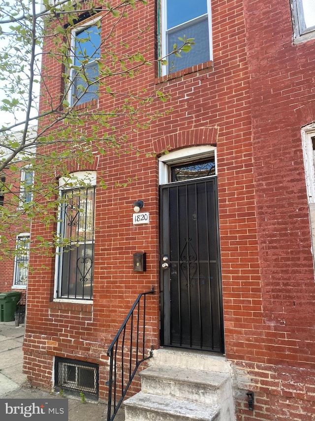 1820 Hope St, Baltimore, MD 21202 - view of exterior entry featuring brick siding
