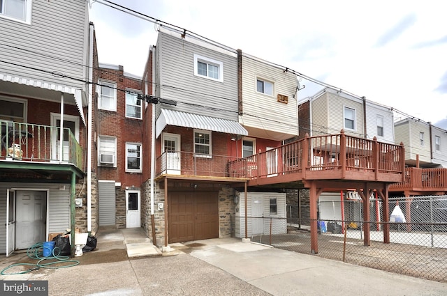 3532 Sheffield Ave, Philadelphia, PA 19136 - exterior space featuring stone siding, an attached garage, fence, and concrete driveway