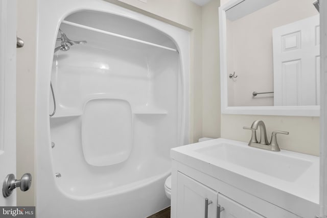 full bathroom featuring toilet and vanity