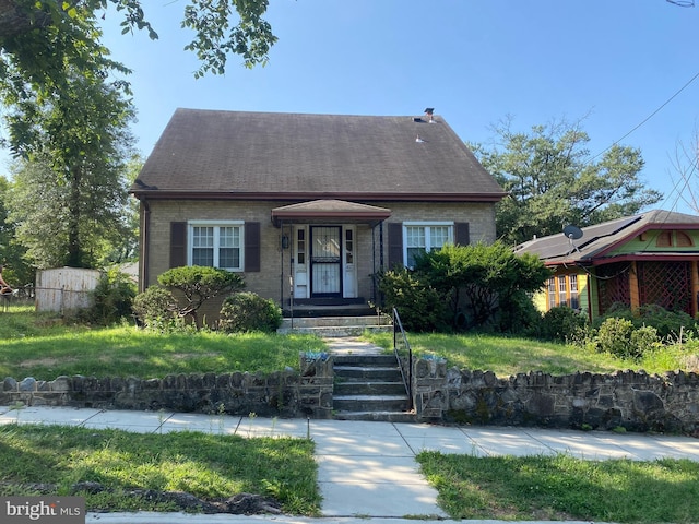 110 Van Buren St NW, Washington, DC 20012 - view of front of house featuring brick siding and roof with shingles