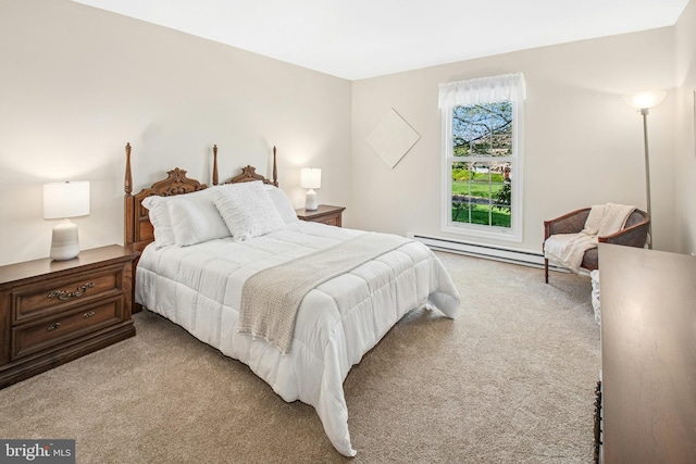carpeted bedroom with a baseboard radiator