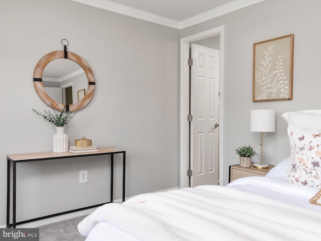bedroom with crown molding