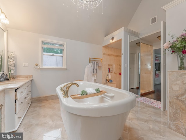 full bathroom with a soaking tub, vanity, high vaulted ceiling, tile patterned floors, and baseboards