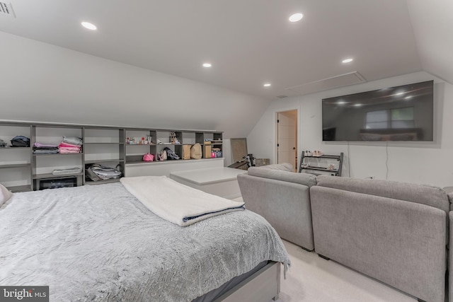 bedroom with lofted ceiling, attic access, recessed lighting, and light colored carpet