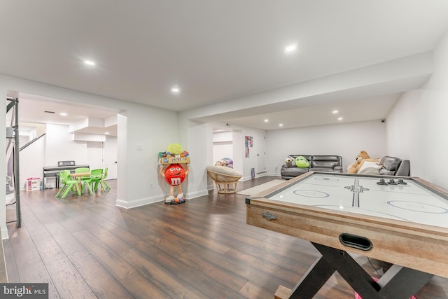 rec room featuring wood finished floors, recessed lighting, and baseboards
