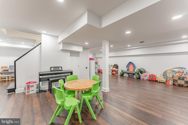 playroom with wood finished floors and recessed lighting