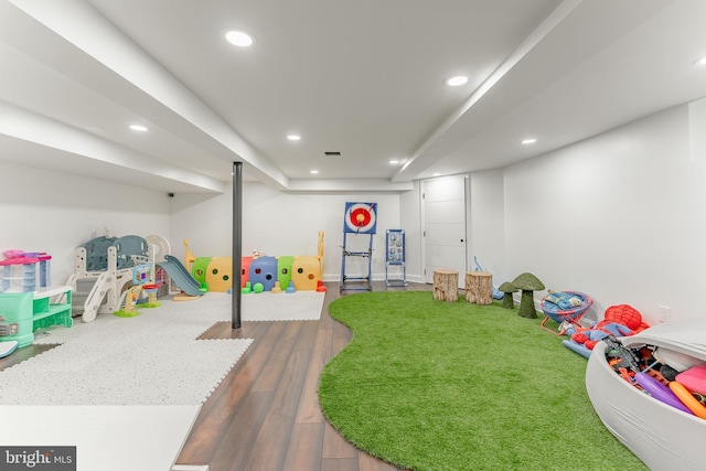 rec room with recessed lighting and wood finished floors