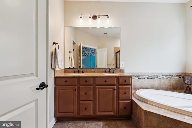 517 Deep Creek Vw, Annapolis, MD 21409 - bathroom with a shower stall, a garden tub, double vanity, and a sink