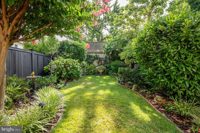 view of yard with fence