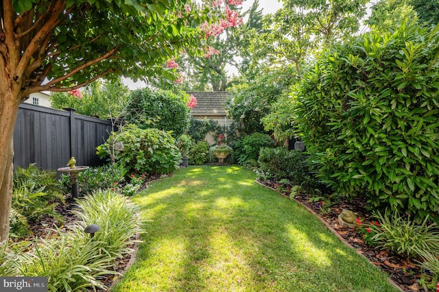 view of yard with fence