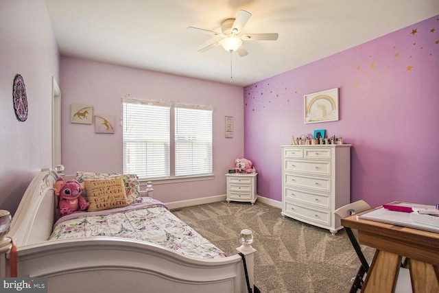carpeted bedroom with baseboards and ceiling fan