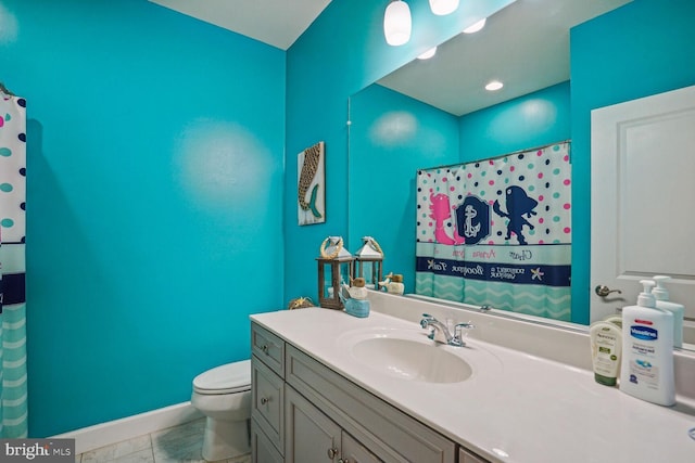 full bathroom featuring vanity, marble finish floor, and toilet