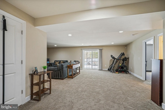 interior space featuring carpet flooring, recessed lighting, and baseboards