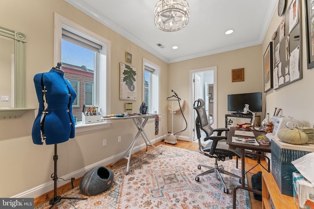 office area with light wood-style floors, a notable chandelier, visible vents, and baseboards