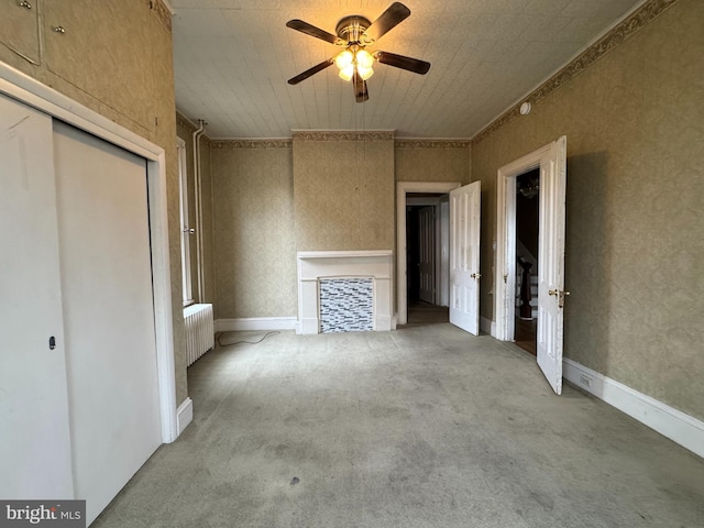 207 E Howard St, Bellefonte, PA 16823 - unfurnished bedroom with carpet flooring, ceiling fan, radiator, and a closet