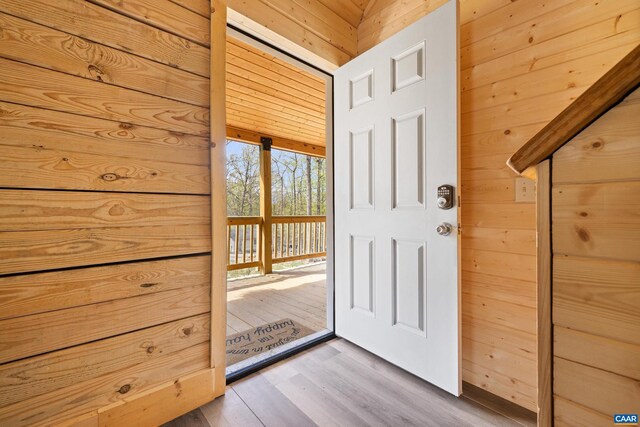 136 Wildwood Ln, Shenandoah, VA 22849 - doorway to outside with wooden walls and wood finished floors