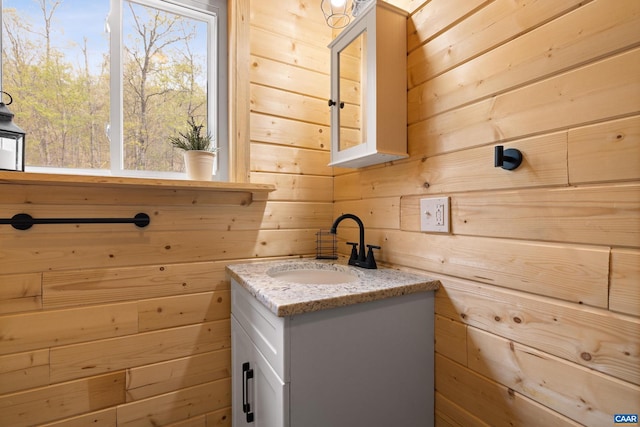 136 Wildwood Ln, Shenandoah, VA 22849 - laundry room with wooden walls and a sink