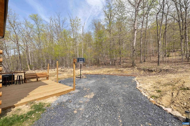 136 Wildwood Ln, Shenandoah, VA 22849 - view of yard featuring a wooden deck and a forest view