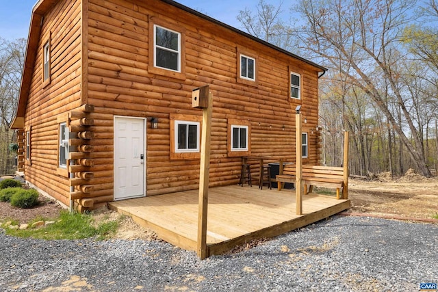 136 Wildwood Ln, Shenandoah, VA 22849 - rear view of house featuring a deck and log exterior
