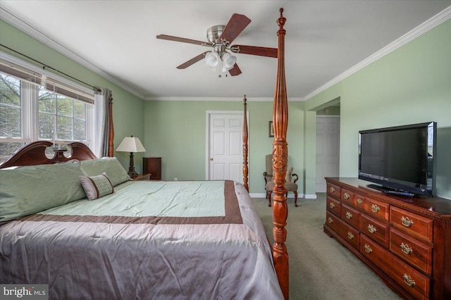 carpeted bedroom featuring crown molding, ceiling fan, and baseboards