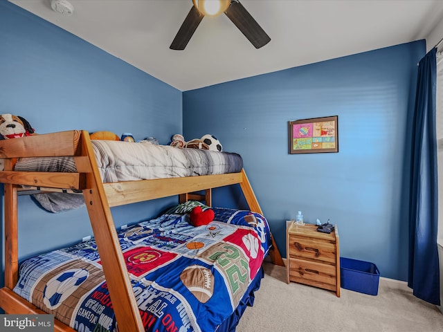 bedroom with carpet floors and a ceiling fan