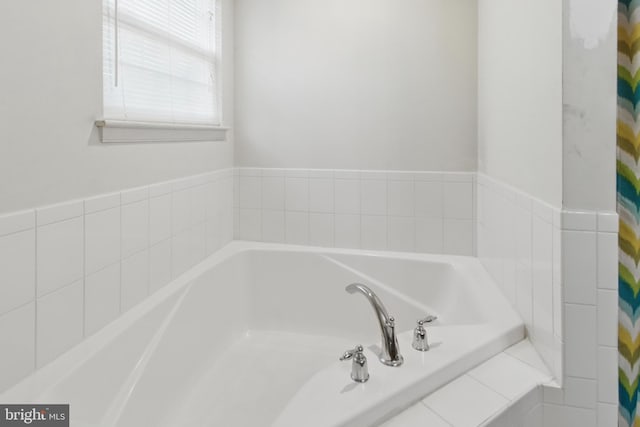 bathroom featuring a garden tub