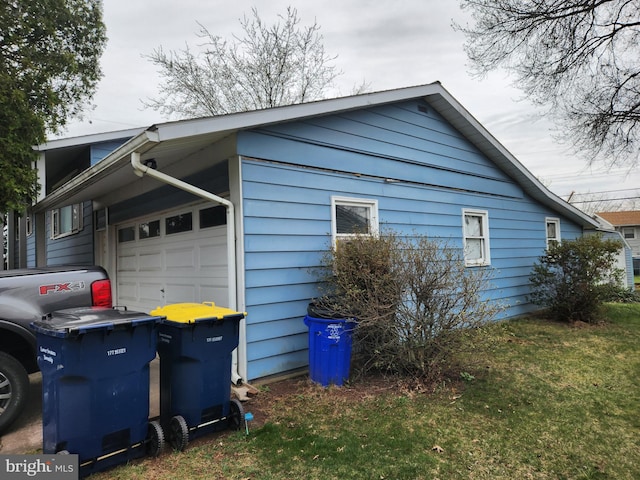view of home's exterior featuring a garage