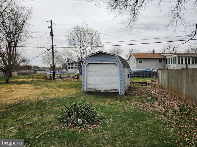 detached garage with fence
