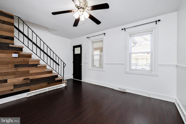 206 Paris Ave, Brooklawn, NJ 08030 - foyer entrance with visible vents, baseboards, ceiling fan, stairs, and dark wood-type flooring