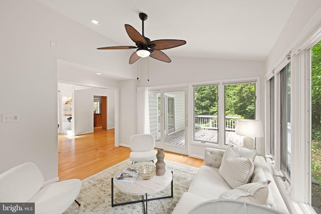 1925 Upper Lake Dr, Reston, VA 20191 - living area with healthy amount of natural light, light wood-style floors, lofted ceiling, a ceiling fan, and recessed lighting