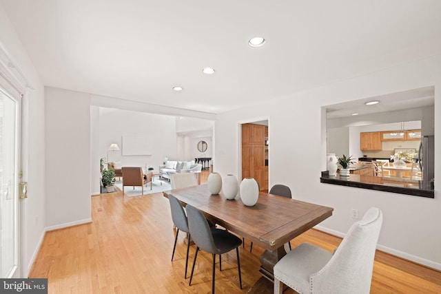 1925 Upper Lake Dr, Reston, VA 20191 - dining space featuring light wood-style floors, recessed lighting, and baseboards