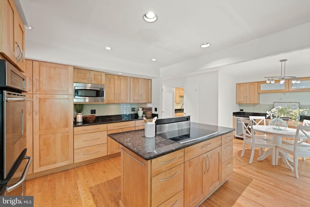 1925 Upper Lake Dr, Reston, VA 20191 - kitchen featuring light brown cabinets, stainless steel appliances, light wood-style floors, a center island, and recessed lighting