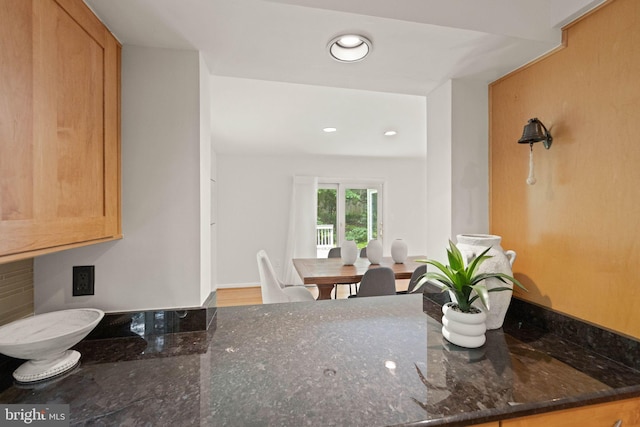 1925 Upper Lake Dr, Reston, VA 20191 - kitchen featuring dark stone counters and recessed lighting