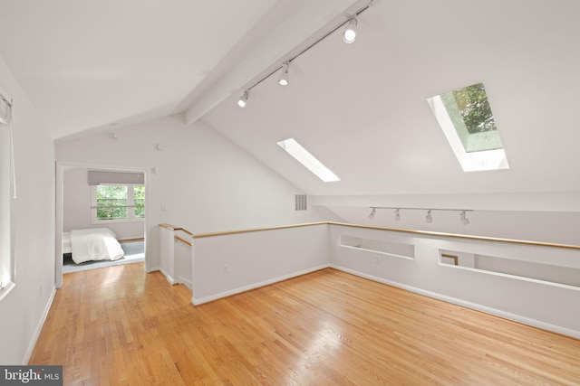 1925 Upper Lake Dr, Reston, VA 20191 - bonus room with a skylight, light wood-type flooring, and baseboards