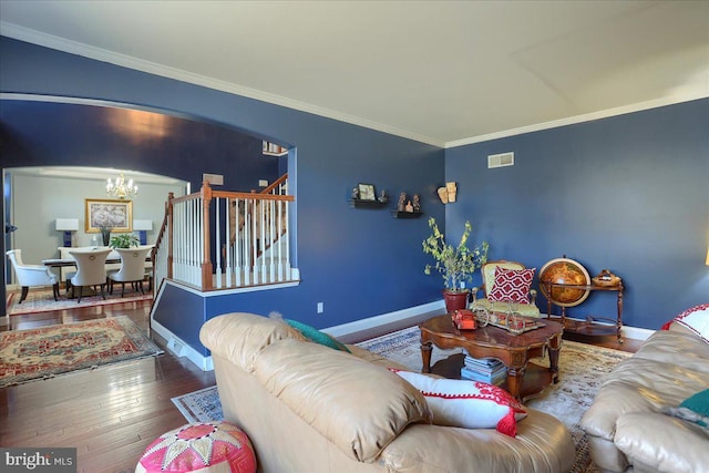 704 Goddard Dr, York, PA 17402 - living room featuring an inviting chandelier, baseboards, visible vents, and stairway