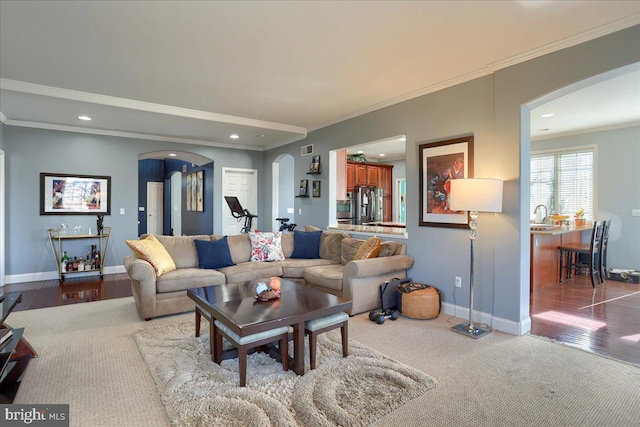 704 Goddard Dr, York, PA 17402 - living room featuring visible vents, baseboards, arched walkways, crown molding, and recessed lighting